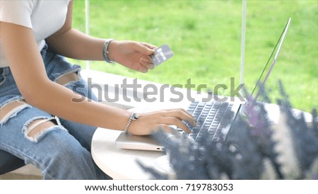 Dolly shot woman hands holding credit card and using laptop, Shopping online concept.