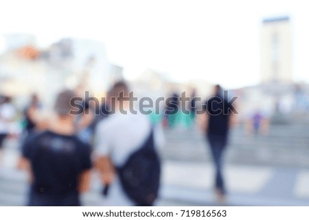 Abstract blurred image, street and people in the side