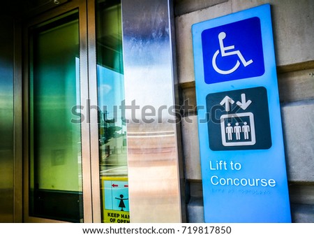 Information sign at the lift or elevator for disabled or people to a concourse of a railway station.