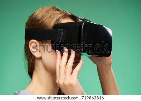 woman in black glasses 3d virtual reality on a green background, games                               