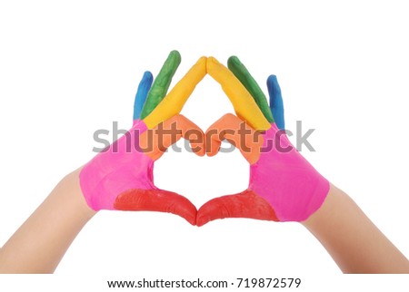 Child's hand painted watercolor in heart isolated on white