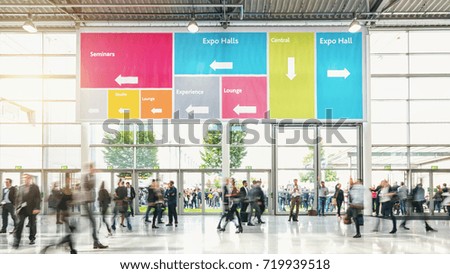 Anonymous Crowd of business people at a trade fair Royalty-Free Stock Photo #719939518