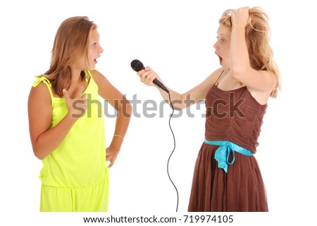 Young beautiful teenage girl conducts interviews with the singer. Isolated on white background