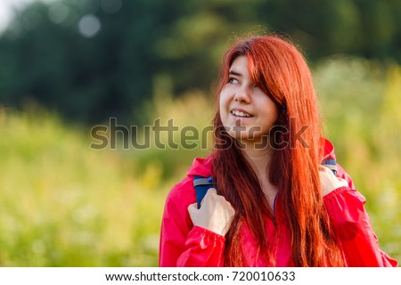 Photo of smiling girl and with backpack