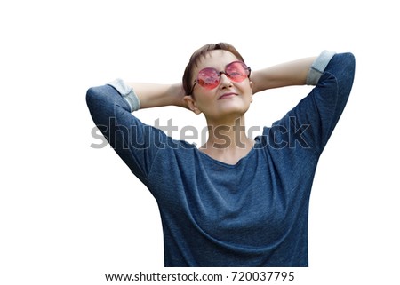 Older woman portrait isolated on white background. Nice picture of 40 50 years old female wearing pink sunglasses with hands behind head with elbows spread out.