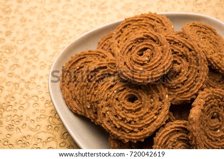 Stock Photo of Chakli or Chakali or Murukku, popular salty food made during diwali festival
