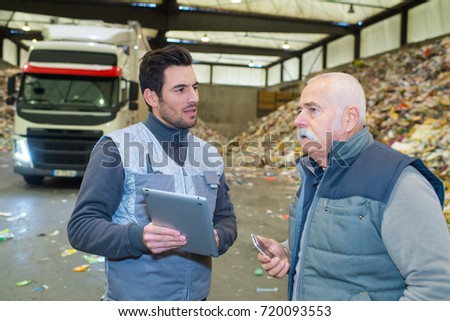 garbage recycling plant worker