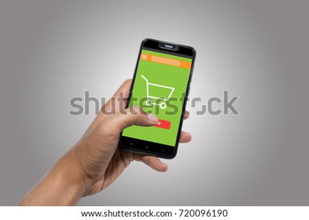 Online shopping sceen on phone background Royalty-Free Stock Photo #720096190