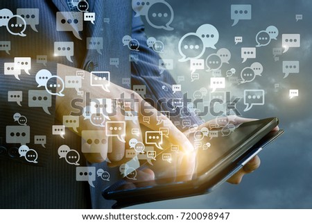 Communication on the tablet .The concept of a business using mobile devices.