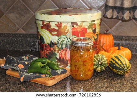 homemade canned hot peppers in glass jar