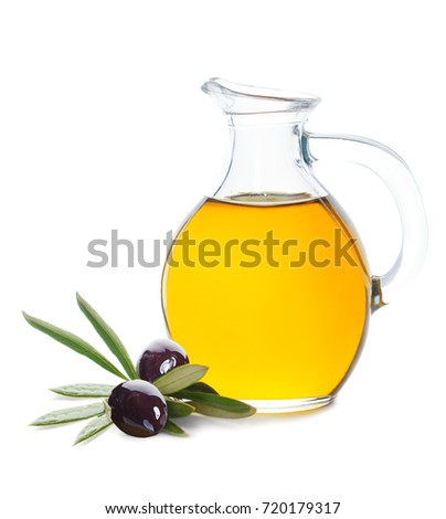 Black Olive, Green Leaves and Glass Bottle of Organic Olive Oil on White Background