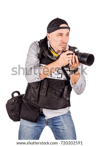 military press photographer with a professional camera. Isolated on white background