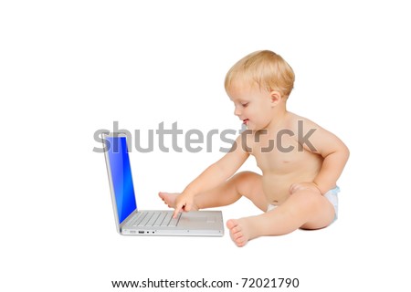 Cute little boy with laptop