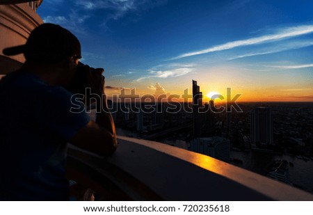 Man Photography with city-scape