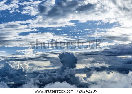 Rain clouds and clouds with fog in blue sky
