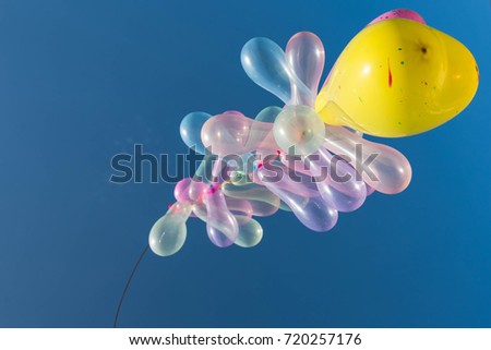multi color balloons with blue sky