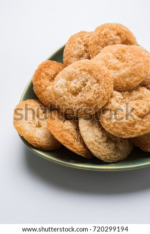 Anarsa which is an authentic sweet pastry-like snack especially made in the festive season like Diwali in Maharashtra and Bihar, selective focus
