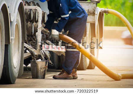 Fueling Up a Freight Transport Truck Royalty-Free Stock Photo #720322519