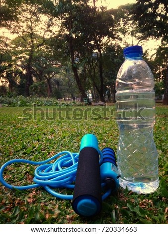 Mineral Water Bottle and Skipping rope at Public Park 