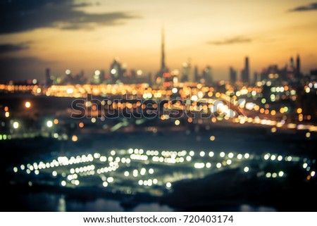 Blurred aerial view of Dubai at night time