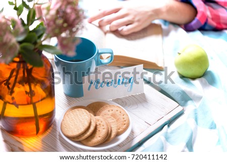 background - beautiful cozy morning and girl reading book
