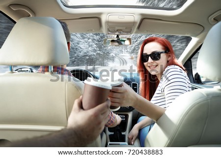 two lovers in car and winter trip 