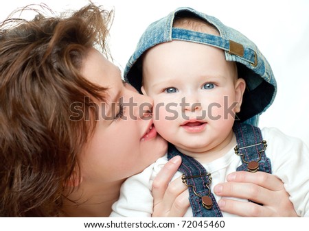 Adorable mother and daughter on a white background