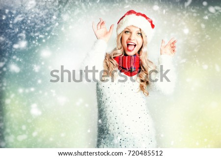 Happy laughing blond woman dressed in Christmas wear
