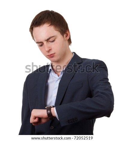 Businessman checking the time on white background