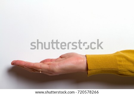 woman hand palm holding something on white background