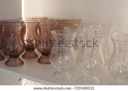 shelf with small vases in a shop