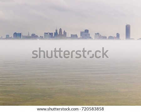 Buffalo, NY skyline in early morning fog