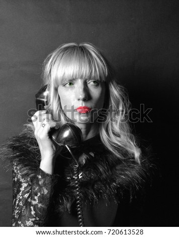 Film Noir woman on vintage telephone