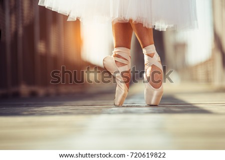 beautiful legs of female classic ballet dancer in pointe
