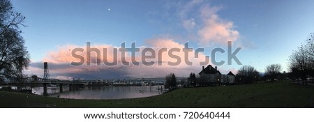 Portland Oregon sunset bridge over Willamette River with moon