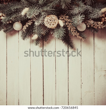 Christmas border design with pines and white baubles