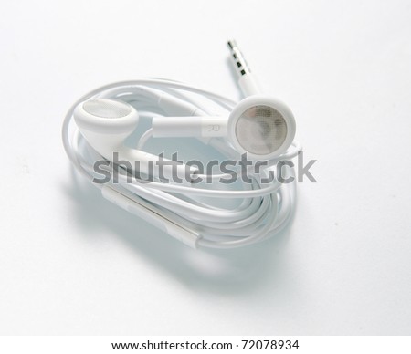 iPhone early model earphones on a white background