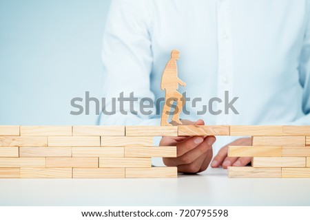 Customer care, support (help), personal development and life insurance concept. Businessman representing company helps (support) customer (client) to overcome an obstacle. Royalty-Free Stock Photo #720795598