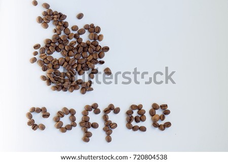 The inscription "coffee" from coffee beans