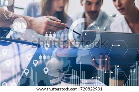 Concept of digital diagram,graph interfaces,virtual screen,connections icon on blurred background.Coworking team meeting Royalty-Free Stock Photo #720822931