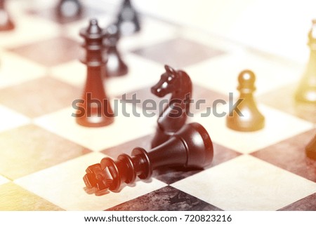 Chess figures - strategy and leadership concept with special light effects