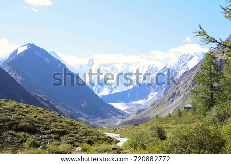 Russia, Republic of Altai. Very beautiful pictures of nature in Altai
High snow-capped mountains, fast, noisy mountain rivers, beautiful meadows and fields and woods - nature of mountain Altai