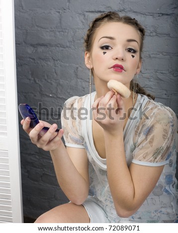 portrait of cute girl with make up like doll