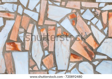 Colorful marble wall with cement as background