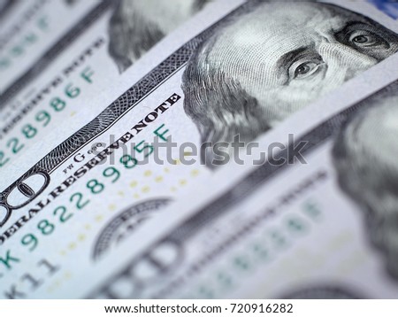 Macro image of a new bill of dollar, with a portrait of Benjamin Franklin. High resolution studio image.