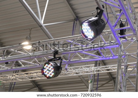 a stage light hanged on a beam structure