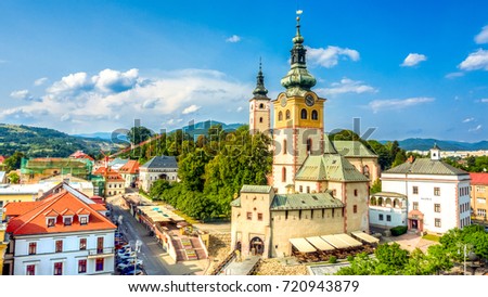 view of main square in Banska Bystrica, Slovakia from above during summer day with historical fortification Royalty-Free Stock Photo #720943879