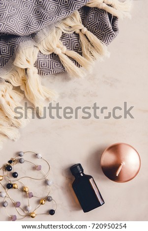 Fall and winter beauty and fashion flatlay in warm colors. Copy space for text. Blogging concept