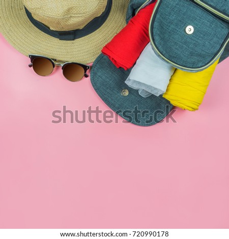 Fashion travel concept Flat lay of pink cute woman accessories hat sunglass bag on colorful background with copy space