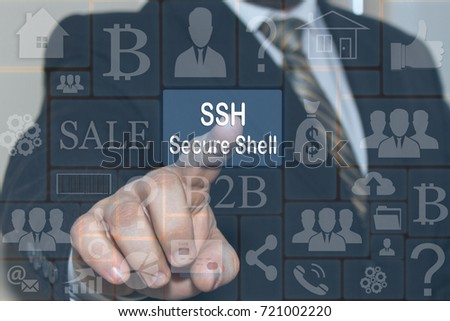 The businessman clicks on the SSH Secure Shell on a touch screen